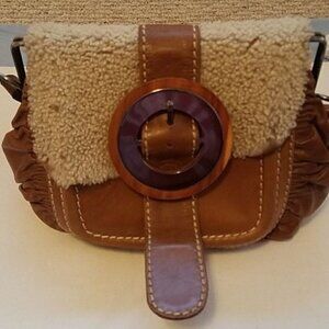 Jamin Peuch accordian bag.